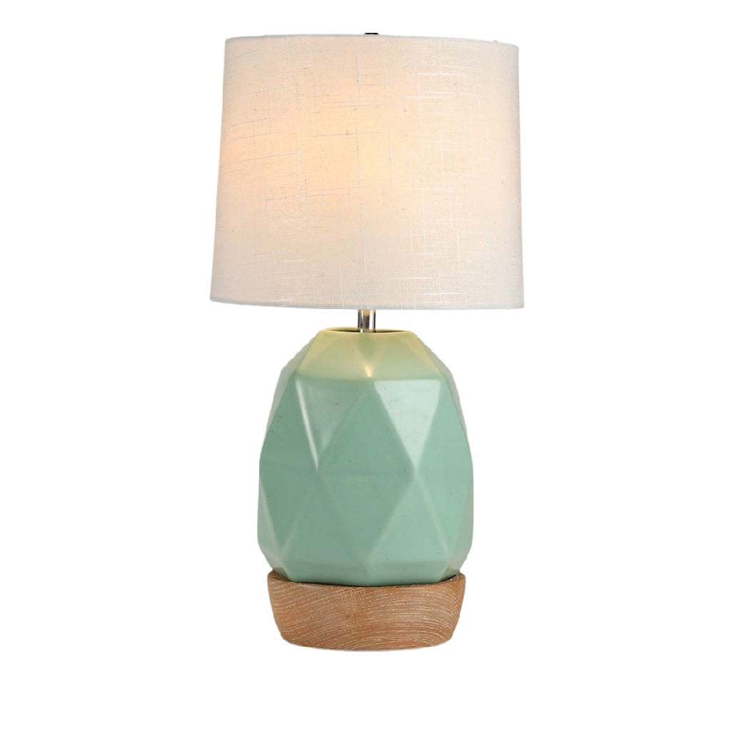 **Lampa stołowa w kształcie diamentu z tekstylnym abażurem**
